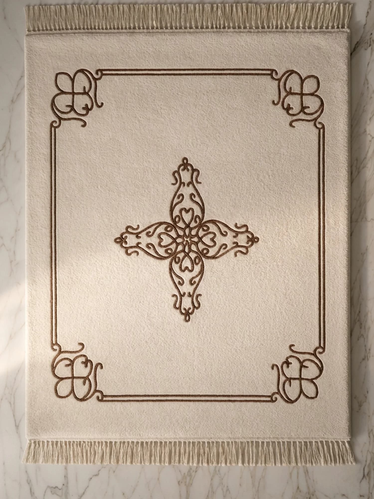 Alankar carpet from above: ivory field, brown double border, scroll corners and central medallion